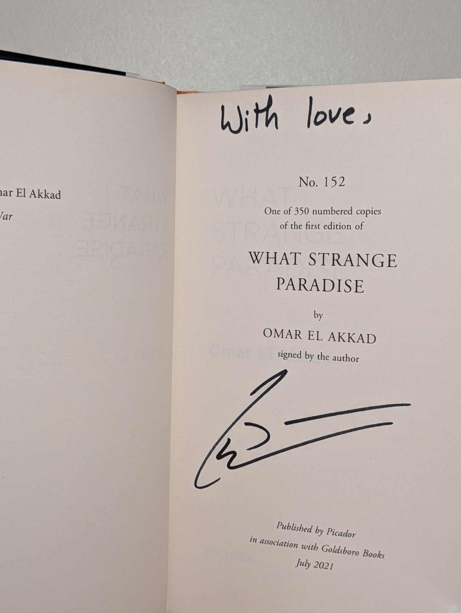 What Strange Paradise by Omar El Akkad (Signed First Edition with sprayed edges) - Fialta Books